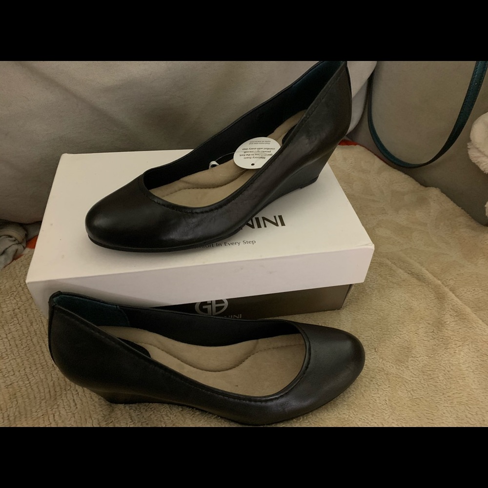 Brand new! Beautiful black leather wedges